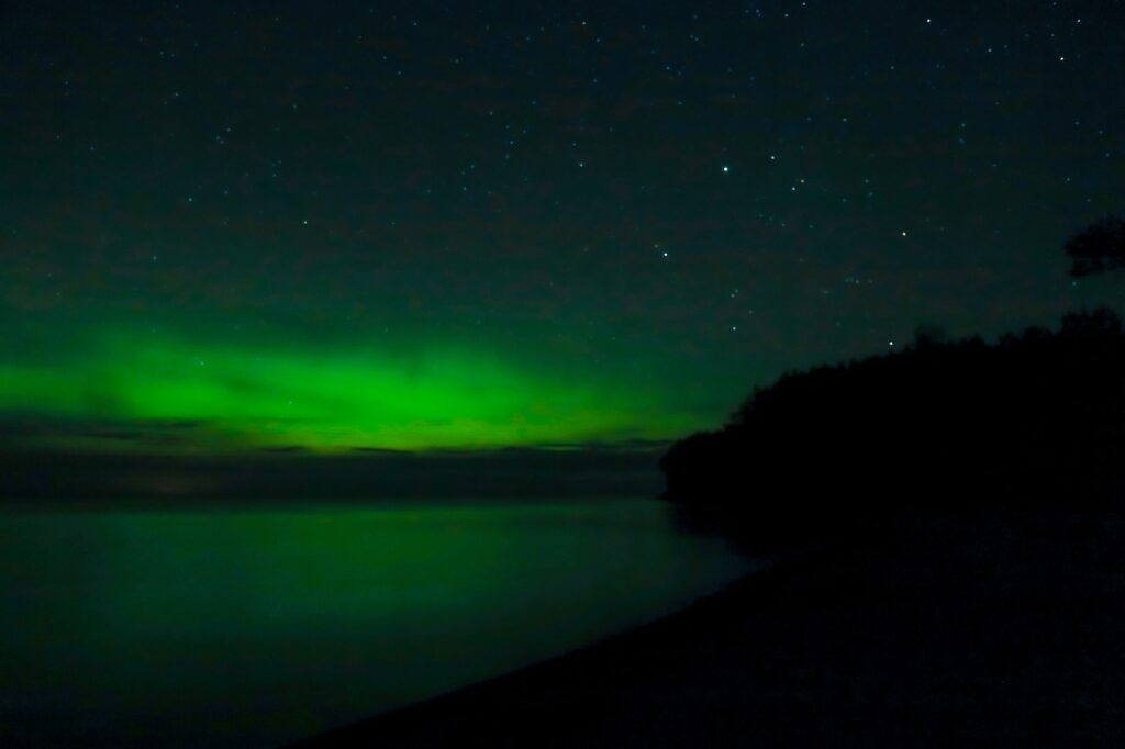 northern lights green aurora black lake