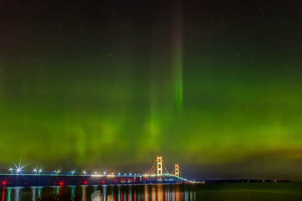 best places to visit in upper peninsula Michigan northern lights over mackinac bridge